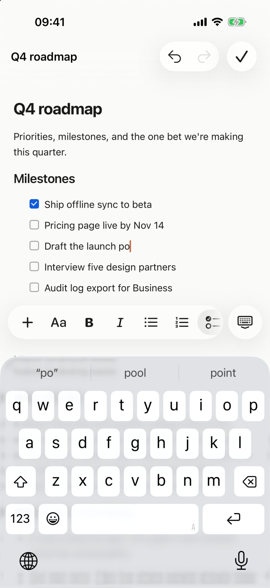 Dawn for iPhone editing a roadmap in place: a new to-do is being typed, with the formatting toolbar above the keyboard